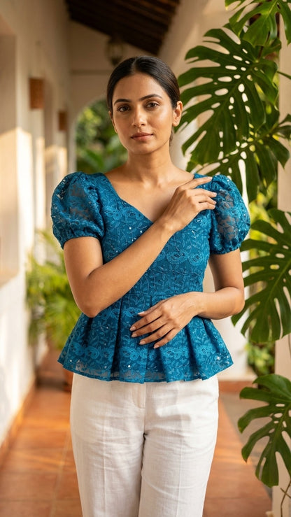 EMBROIDERED PEPLUM TOP