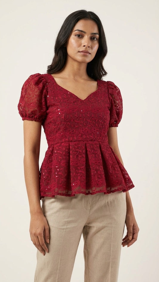EMBROIDERED PEPLUM TOP